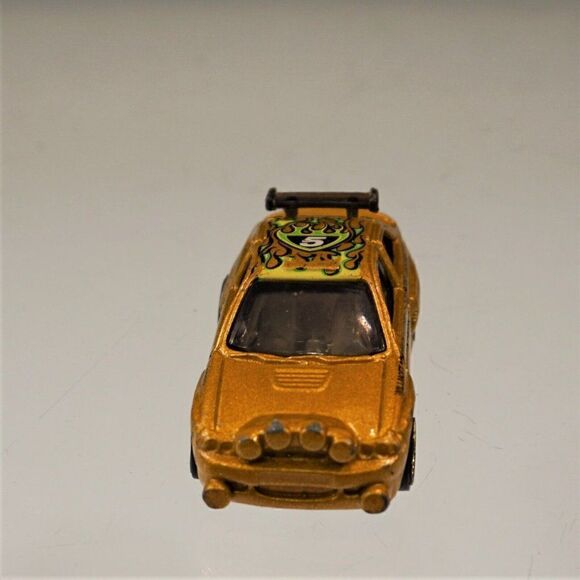 Hot Wheels Mattel 1996 Escort Rally Gold #5 Die Cast Car Loose - Picture 3 of 6